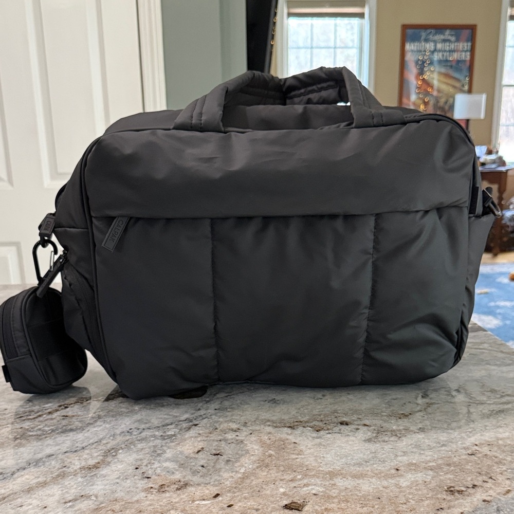 Calpak Luka Duffel with matching Luka backpack charm